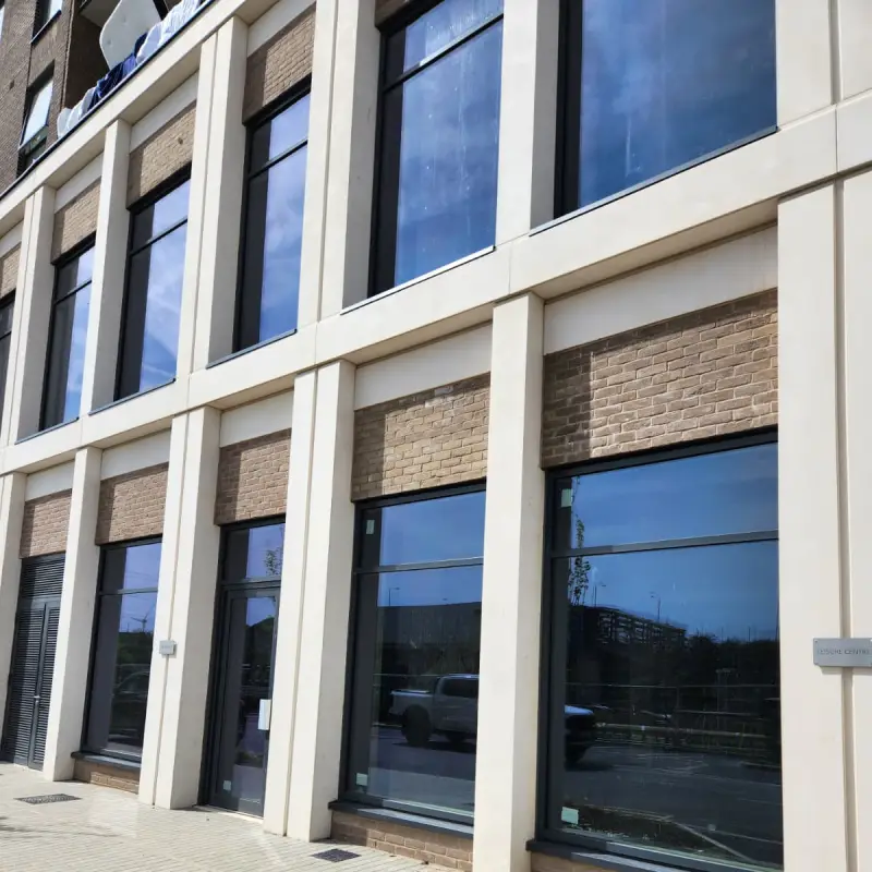 Energy-efficient aluminium windows installed in a residential and commercial building in Wales