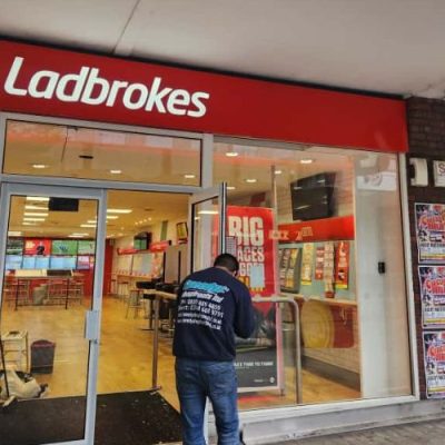 automatic sliding doors installed at retail shop entrance in Wales